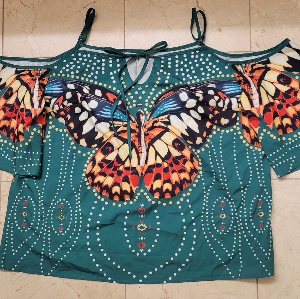 Woman's peek-a-boo sleeve blouse